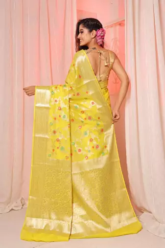 Yellow soft silk saree with allover zari and mina work
