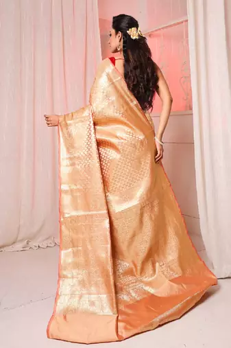 Beige brocade silk saree with all over zari work