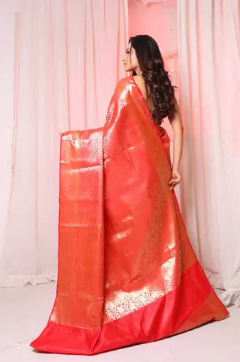Red brocade silk saree with all over zari work