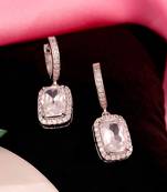 White claro earrings