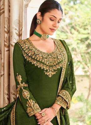 Green Silk embroidered punjabi suits 2