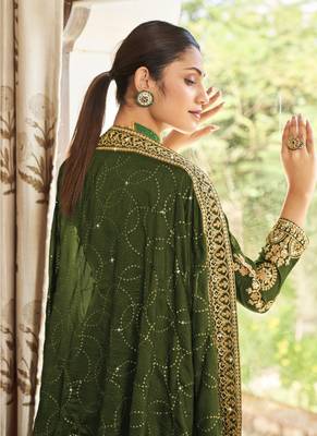 Green Silk embroidered punjabi suits 3
