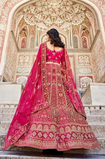 Rani Pink Embroidered Velvet Lehenga Choli