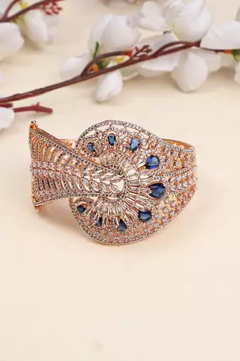 Stylish Rosegold Plated Blue AD stone Studded closed Bracelet