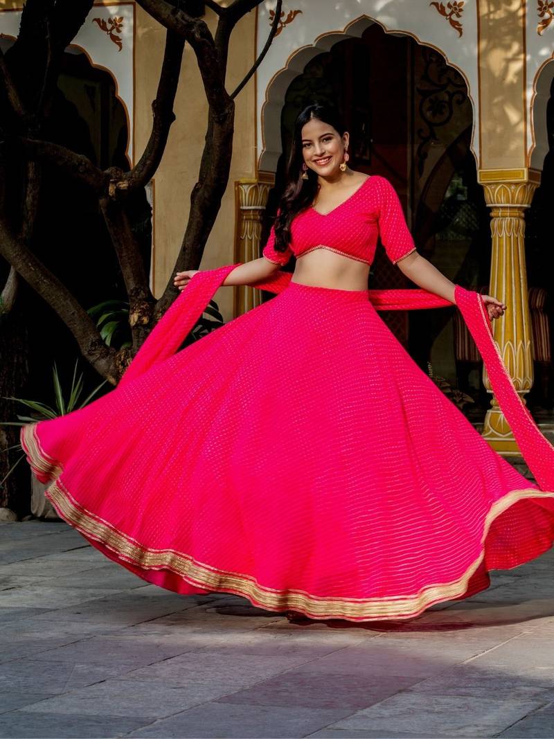 Captivating Pink Laheriya Print Georgette Designer Lehenga Choli