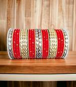 Rich texture bangle set with silk thread bangles and kundan kada by leshya