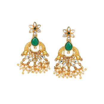 Traditional golden stone jewellery set with green center and kundan by leshya 3