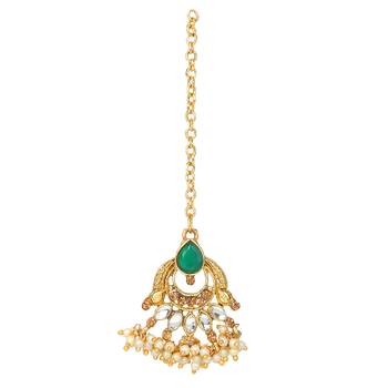 Traditional golden stone jewellery set with green center and kundan by leshya 4