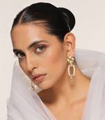 White gold tone kundan and pearl dangler earrings