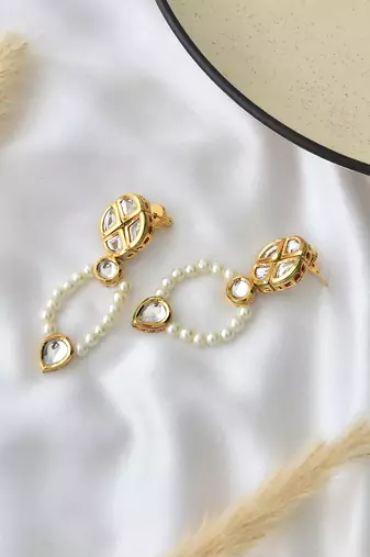 White gold tone kundan and pearl dangler earrings