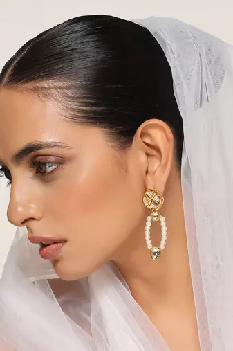White gold tone kundan and pearl dangler earrings