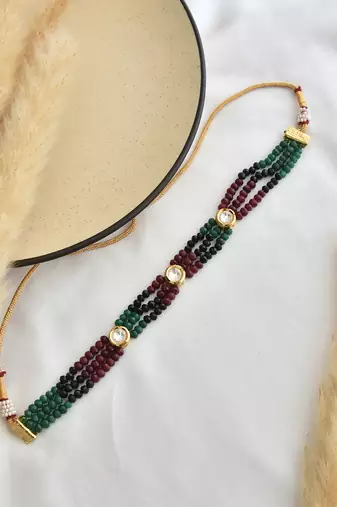 Red and green gold tone kundan choker