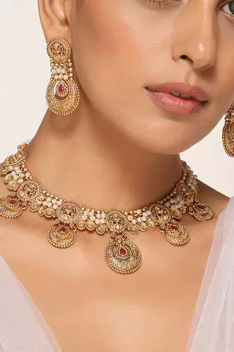 Red gold tone temple necklace set