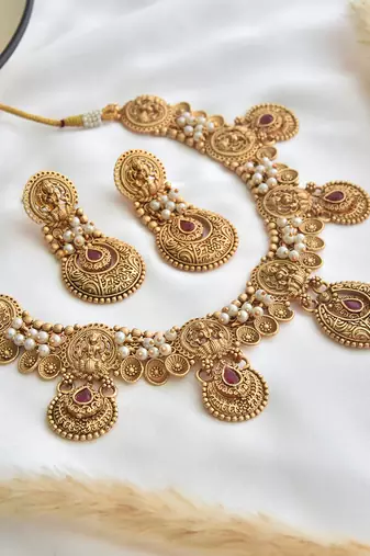 Red gold tone temple necklace set