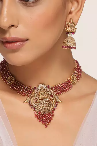 Red gold tone temple necklace set