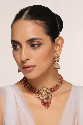 Red gold tone temple necklace set