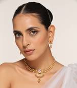 Red gold tone temple necklace set