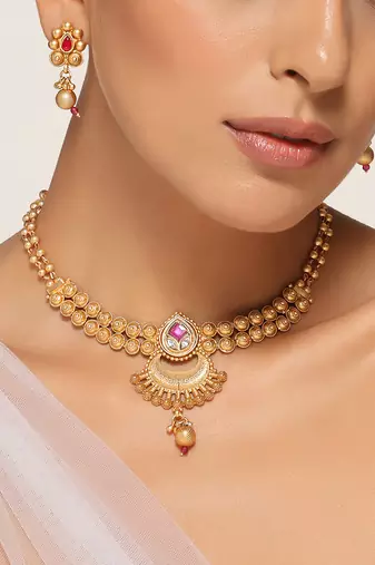 Red gold tone temple necklace set