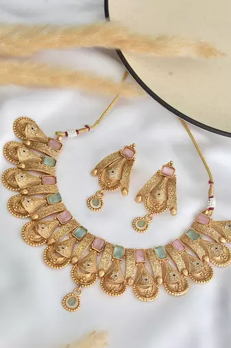 Mint and pink gold tone temple necklace set