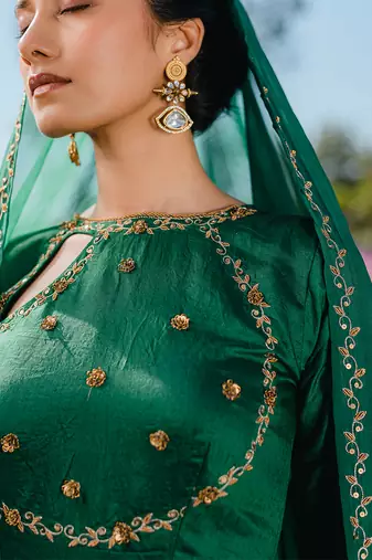 Emerald green embroidered anarkali set
