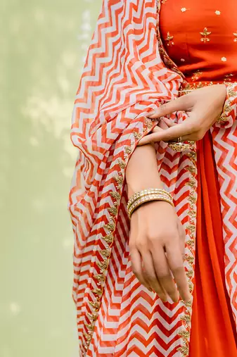 Reddish orange embroidered anarkali set