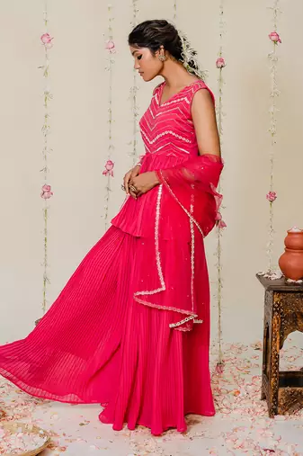 Fuschia pink pleated embroidered peplum sharara set