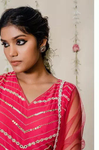 Fuschia pink pleated embroidered peplum sharara set