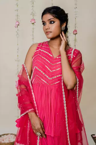 Fuschia pink pleated embroidered peplum sharara set
