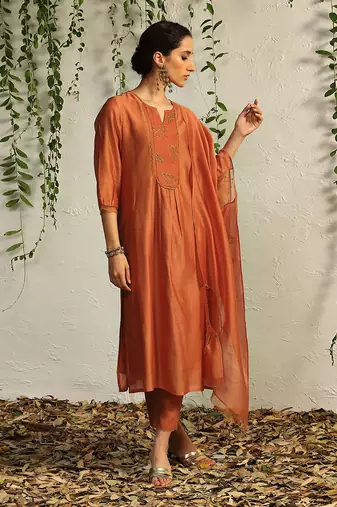 Spice orange chanderi nakshi and zari work kurta set