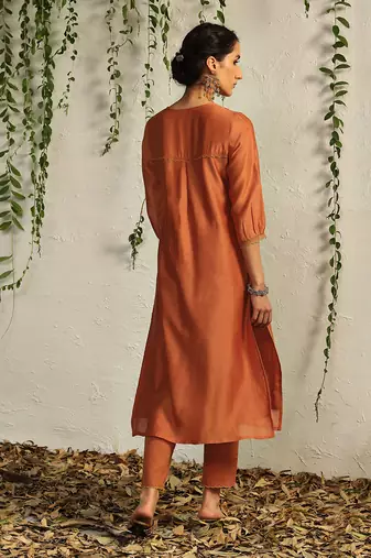 Spice orange chanderi nakshi and zari work kurta set