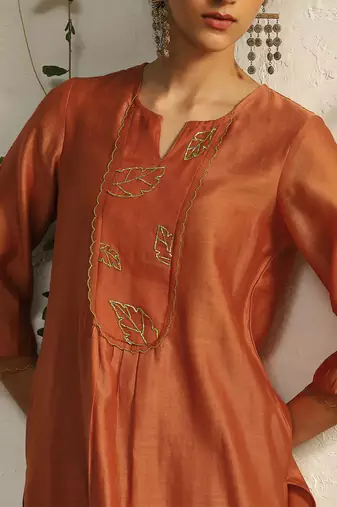 Spice orange chanderi nakshi and zari work kurta set