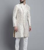 Men designer brocade silk white sherwani set with golden print  by treemoda