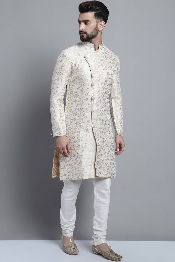 Men designer brocade silk white sherwani set with golden print  by treemoda
