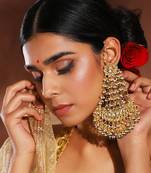 Gold kundan earrings