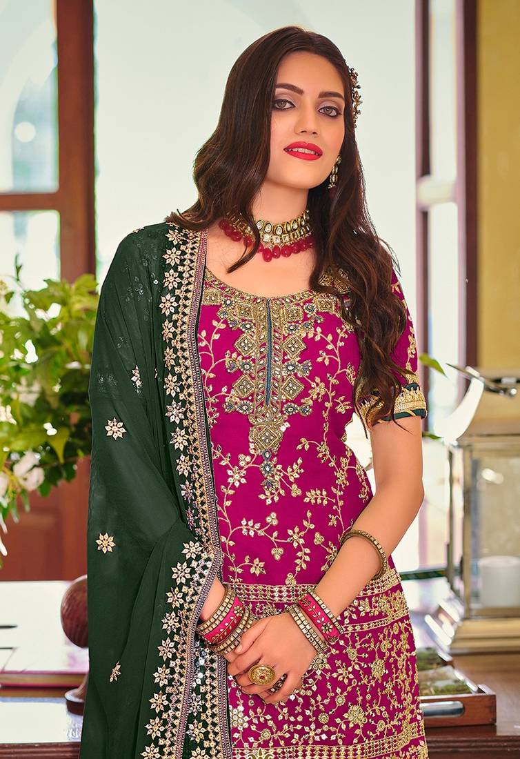 Magenta color embroidered faux georgette fancy palazzo suit