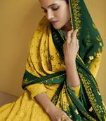 Yellow color faux georgette semi stitched embroidered designer suit