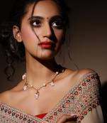 Pink gold plated kundan necklace