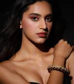 Green enameled gold plated kundan bangle