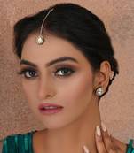 Gold dual tone kundan maang tikka with earrings