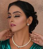 Black kundan and pearl choker with studs