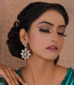 Gold dual tone kundan flower studs