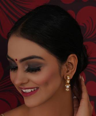 Gold kundan earrings with pearl drops 2