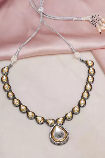 Gold long tear drop dual tone kundan neckpiece
