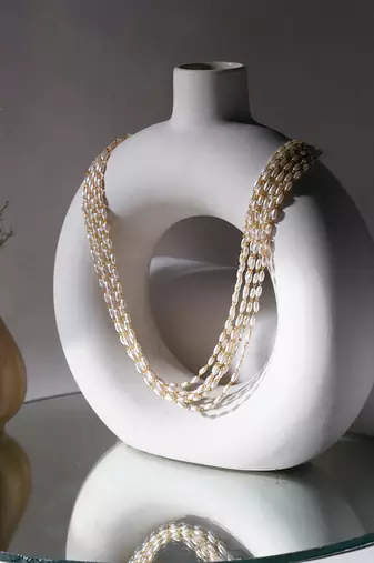 Gold layered pearl neckpiece