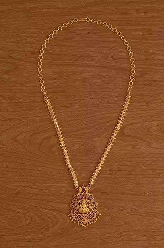  golden necklace with laxmi pendant and green stones one gram gold