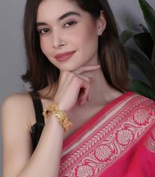 Women set of 2 gold-plated stone-studded elephant and doli temple bangle