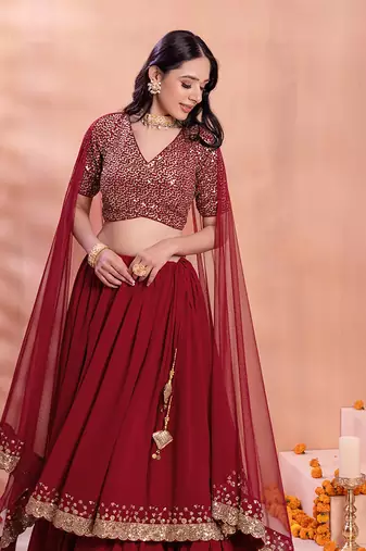 Wonderful Maroon Sequins Georgette Party Wear Lehenga Choli