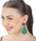 Green kundan dangler earrings