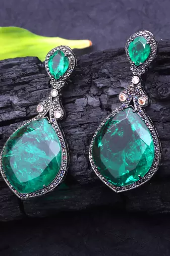Green kundan dangler earrings