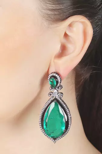 Green kundan dangler earrings